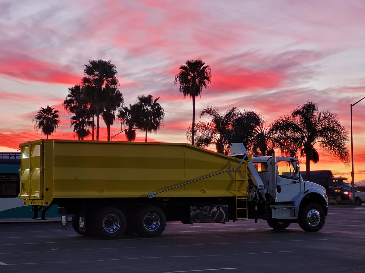 The Yellowsack team with a crane truck